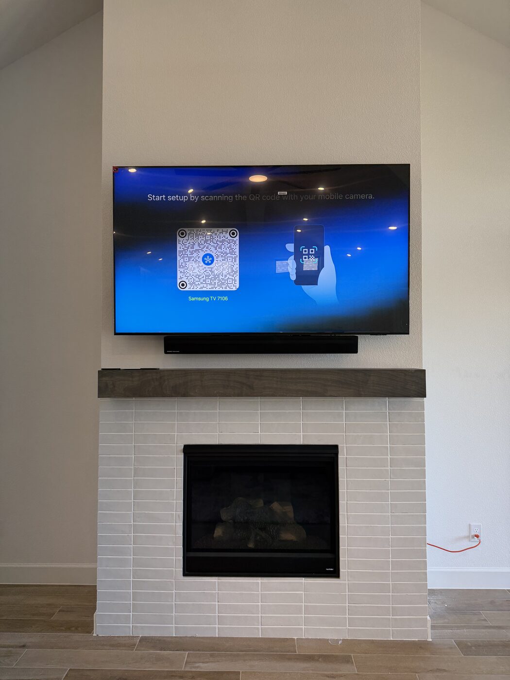TV mounted above fireplace with concealed wires, Houston TX #5